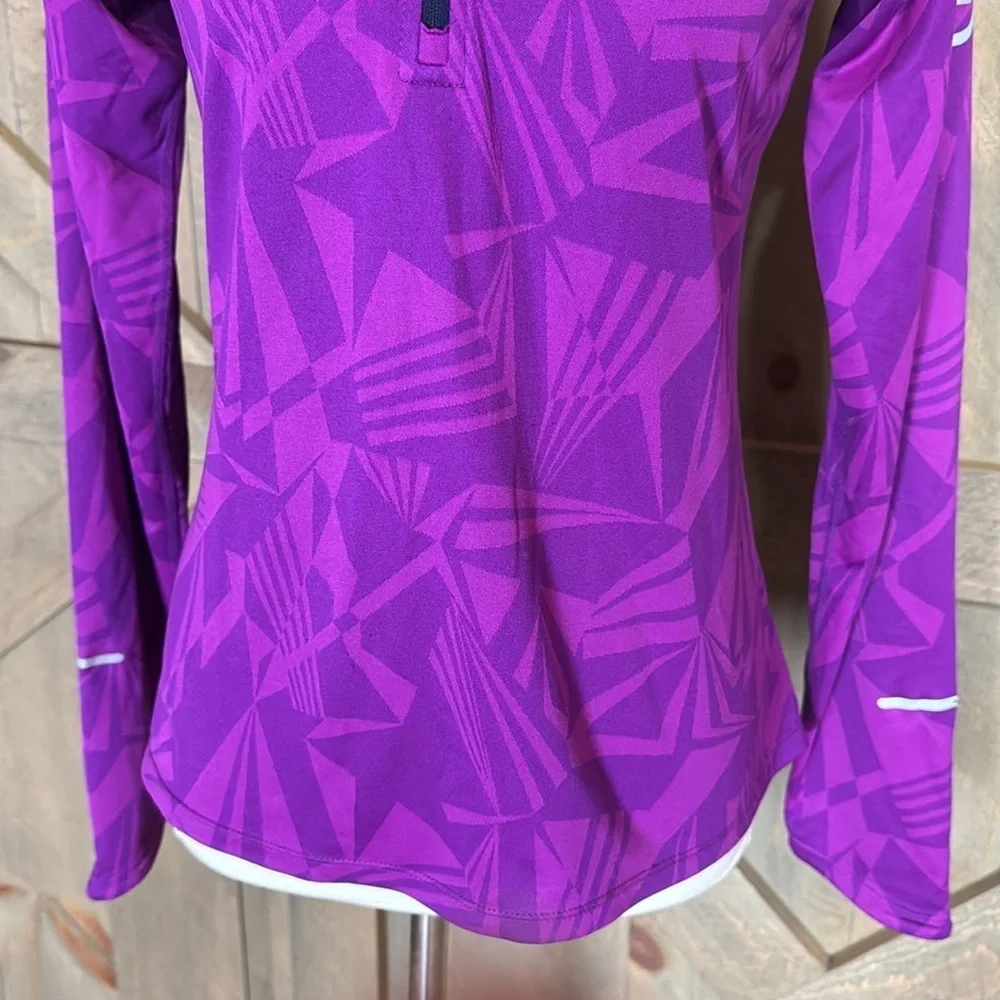 Nike Dri-Fit running top with reflective details Size Medium Magenta / pink